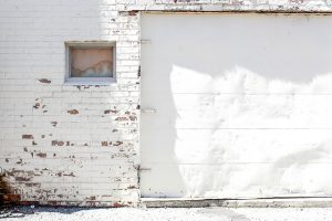 How to Repair a Warped Garage Door